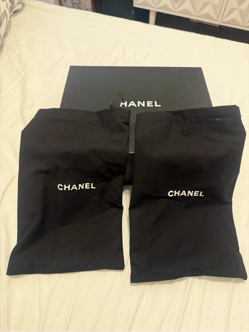 CHANEL Black Braided Slides with Gold Chain Accents
